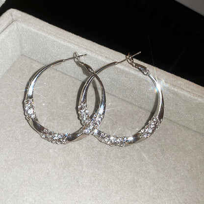 Luxury Twisted Rhinestone Earrings – Elegant, Sparkling & Timeless